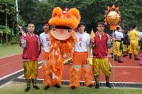 Students taking part in the inter-collegiate lion and dragon dance performance